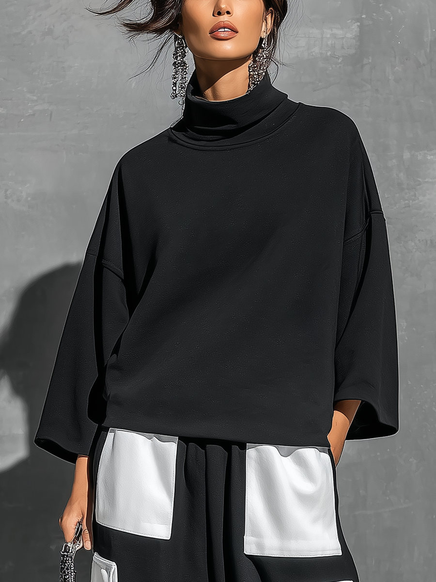 Conjunto Deportivo Negro en Punto de Algodón: Sudadera Oversize de Cuello Alto y Manga 3/4, con Jogger Cargo Bicolor Blanco y Bolsillos